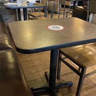 a table and chairs in a restaurant