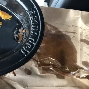 Grease incredibly hot. Burned hand from hole on plastic. Grease spilled everywhere in car!