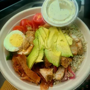 BLT bowl (quinoa, lettuce, bacon, chicken, tomato, pickled onion, egg, ranch)
