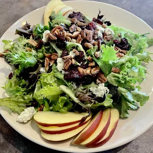a salad with apples and pecans