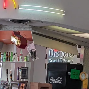 What is that bag. Why is it hanging from the menu board?