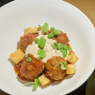 MEATBALLERS beef &amp; pork meatballs, smoked white bean sauce, garlic croutons, basil sprouts