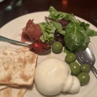 Burrata with Fig Jam - seasonal fall appetizer with prosciutto, olives, and dressed greens. Delicious!