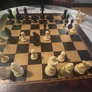 a chess board with chess pieces on it