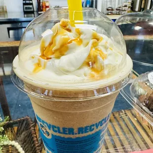 an iced coffee with caramel and whipped cream