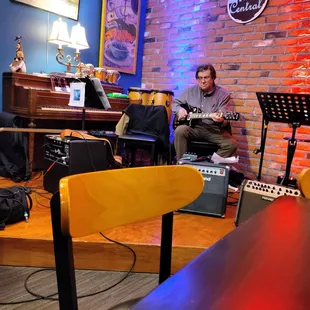 a man playing guitar