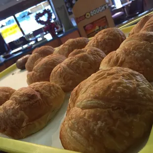 a tray of freshly baked croissants