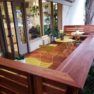 Deck under the shade of trees.