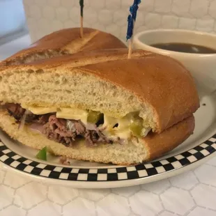 Manager&apos;s special roast beef Swiss onions Peppers jalapenos aujus for dipping that&apos;s why it&apos;s the manager special yum