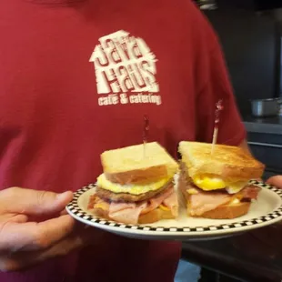 The breakfast grinder ham bacon sausage two eggs cheese and mayonnaise enjoy some bread that&apos;ll fill you up!