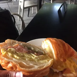 a person holding a plate of food