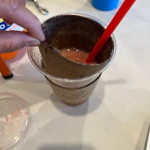 Cardboard sleeve in drink