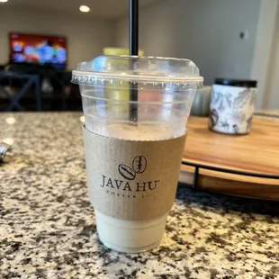 a cup of coffee on a counter