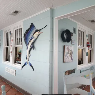 a sailfish on the wall