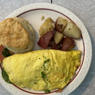 Greek Omelet, potatoes, and the real star- the biscuit!