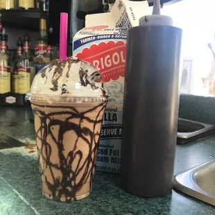 a chocolate milkshake and a drink