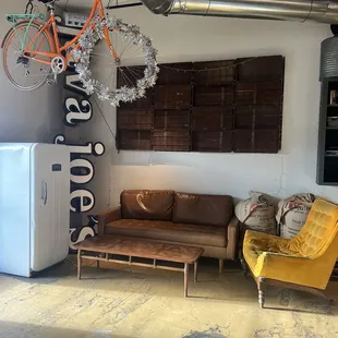 a bicycle hanging from the ceiling