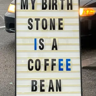 a sign that says, my birth stone is a coffee bean