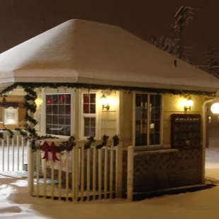 a gazebo covered in snow