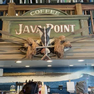 two people working at a coffee shop