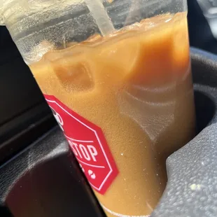 Medium iced oatmilk vanilla latte