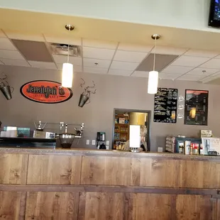 a woman behind the counter