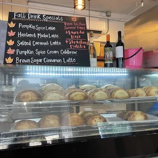 a display case filled with pastries