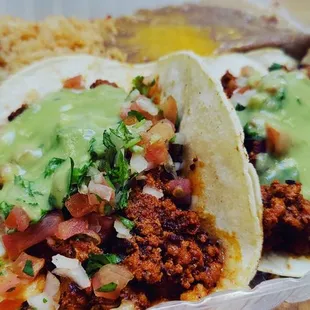 Tacos Adobada with rice and beans