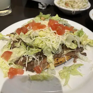 Asada tostada. I liked it. Could use some sour cream though