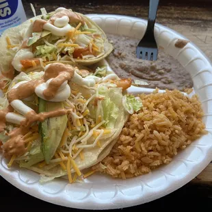 The number 14 on their menu.  Two Grande Shrimp Tacos 2 Shrimp Tacos served with Rice and Beans.