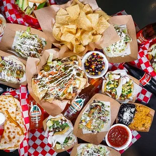 a variety of tacos and chips