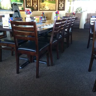 Cute dining area with tables and booths.