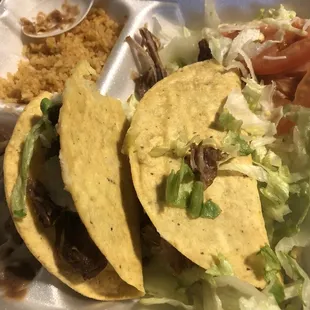 Carnitas crunchy taco with I think store bought shells not an authentic fried corn tortilla