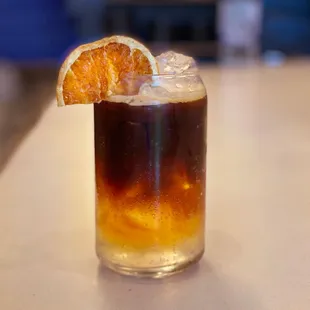 Espresso Tonic, with orange wedge. Refreshingly zingy!