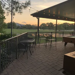 patio with tables and chairs