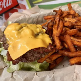 Bun-less bacon cheeseburger with sweet potato fries