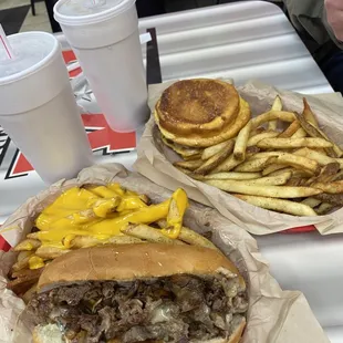 Texas Philly Cheesesteak Sandwich and Cheese Fries / Mushroom Shroom Burger 8oz Burger and Cajun Fries