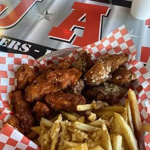 buffalo wings and garlic parm wings served with Garlic Fries