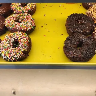 Chocolate chocolate, rainbow sprinkles, chocolate sprinkles, peanut topping.