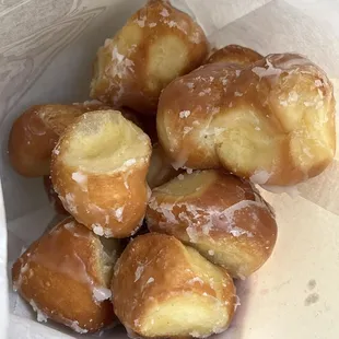 a dozen delicious donut holes (I hungrily ate some prior to the photo)