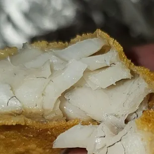 I don&apos;t know what it is, Hair, dirt, I&apos;ve eaten fish for 36 years and never seen anything inside like that.