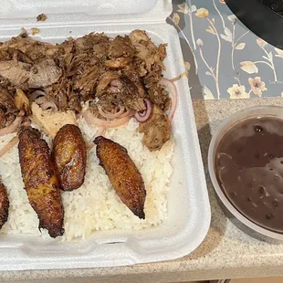 Roasted Lechon with beans/rice/plantains