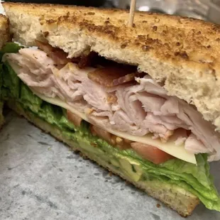 Turkey bacon guacamole deli sandwich