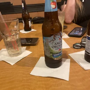 a bottle of beer on a table