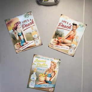 a fridge with three magazines on it