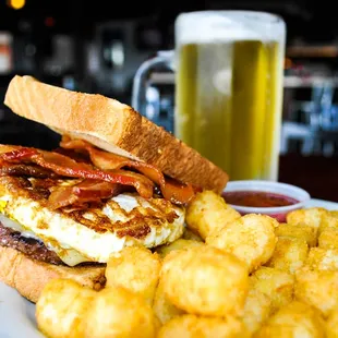 a plate of food and a beer