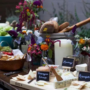 a variety of cheeses on a table