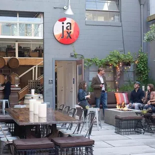 a group of people sitting outside