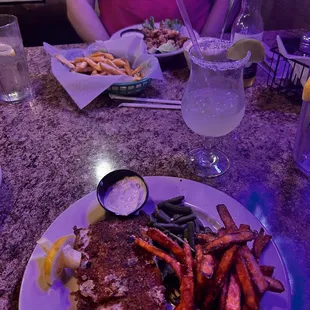 Gator tail and crusted Mahi