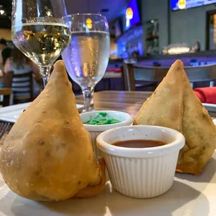 VEGETABLE SAMOSA Crispy fried pastry stuffed with potatoes peas